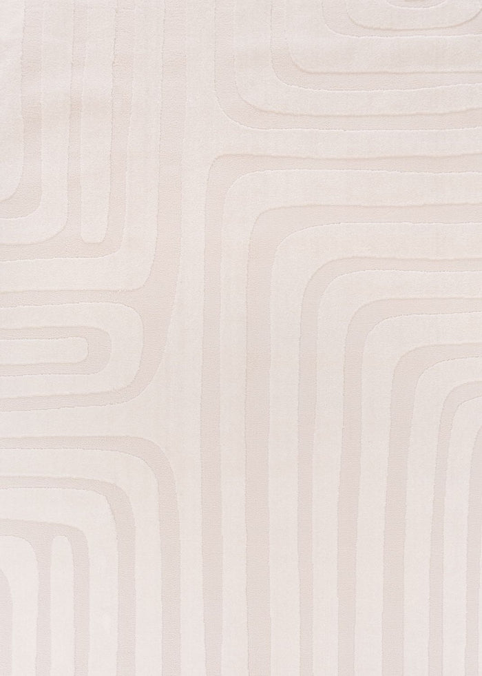 Close-up of a textured beige wall with wavy patterns