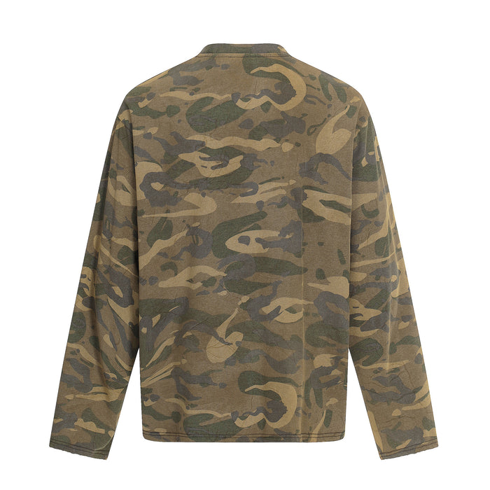 Back of camouflage long sleeve tee in brown, green, and tan tones