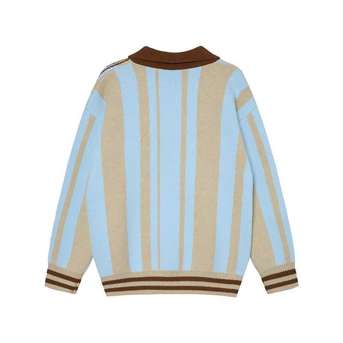 Back view of a beige and light blue striped knit polo sweater with brown collar and hem