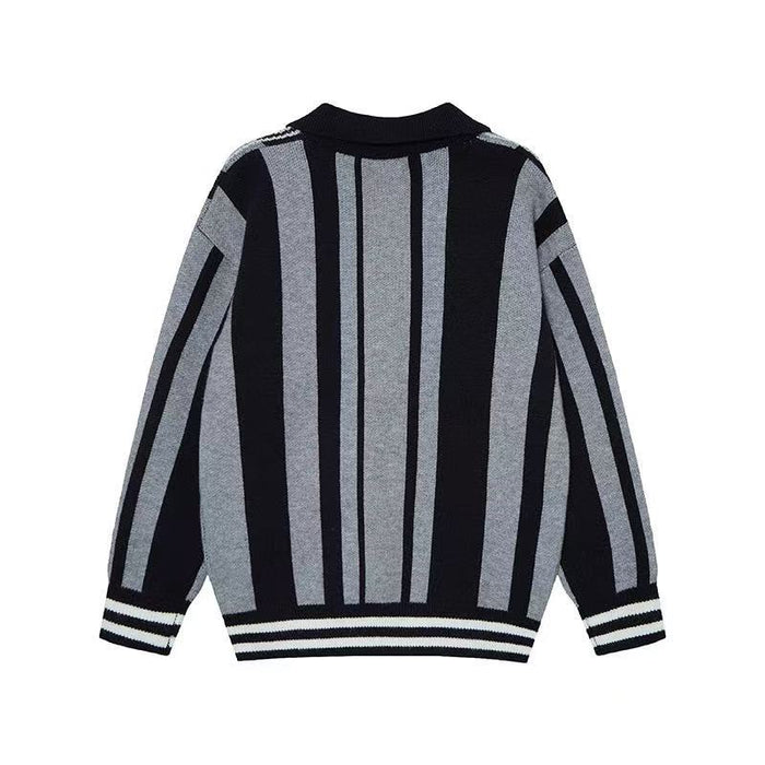 Back view of a gray and black striped knit polo sweater with striped cuffs and hem