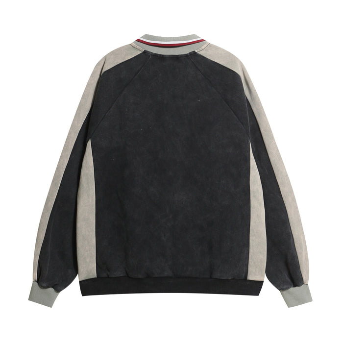 Black rugby sweatshirt with gray sleeves, striped collar, and ribbed cuffs, back view