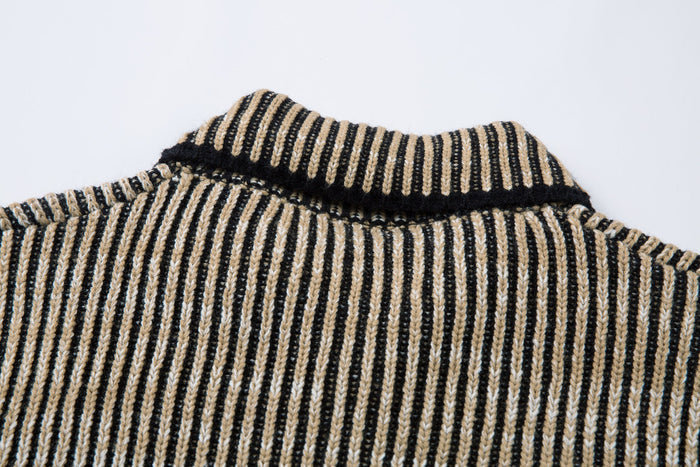 Close-up of the jacket's ribbed stand collar with beige, black, and white stripes