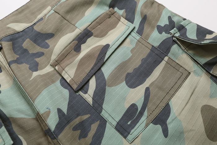 Close-up of back cargo pocket on woodland camo shorts