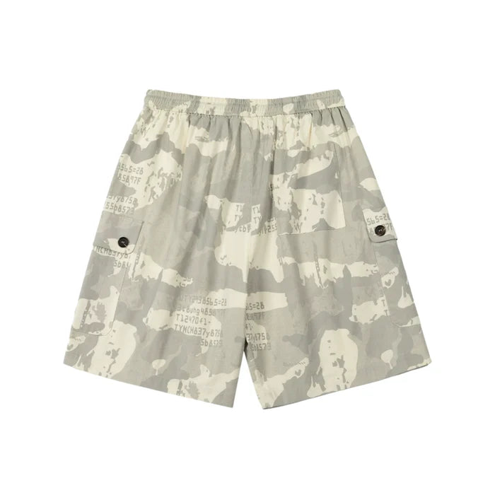 Men's grey and off-white camo cargo shorts with button flap side pockets and elastic waistband, laid flat on white background