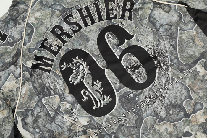 Close-up of back-center 06 print on camouflage mesh jersey with large black lettering