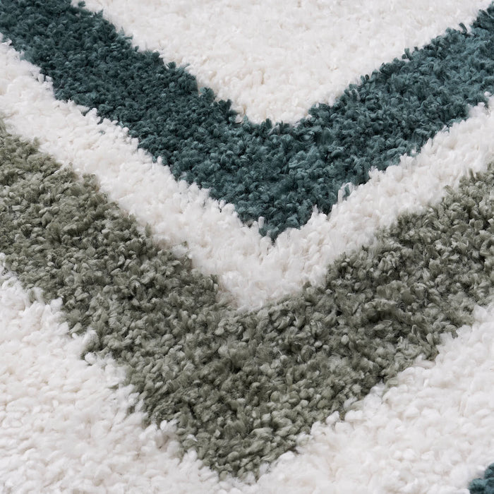 Moodi Shaggy Green Rug, Bordered design, underfloor heating | THE RUGS