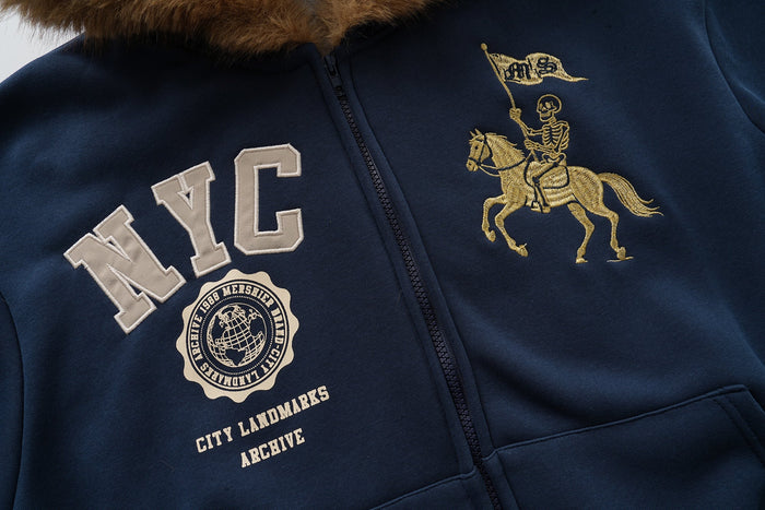 Front chest view of navy zip hoodie with NYC and horse rider embroidery