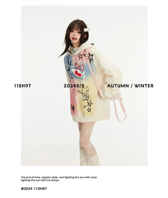 A person in a Seakoff Pastel Cat Graffiti Hoodie pairs it with patterned stockings and leg warmers against a plain backdrop. Text on the image reads "11SH97 2024 S/S Autumn/Winter.
