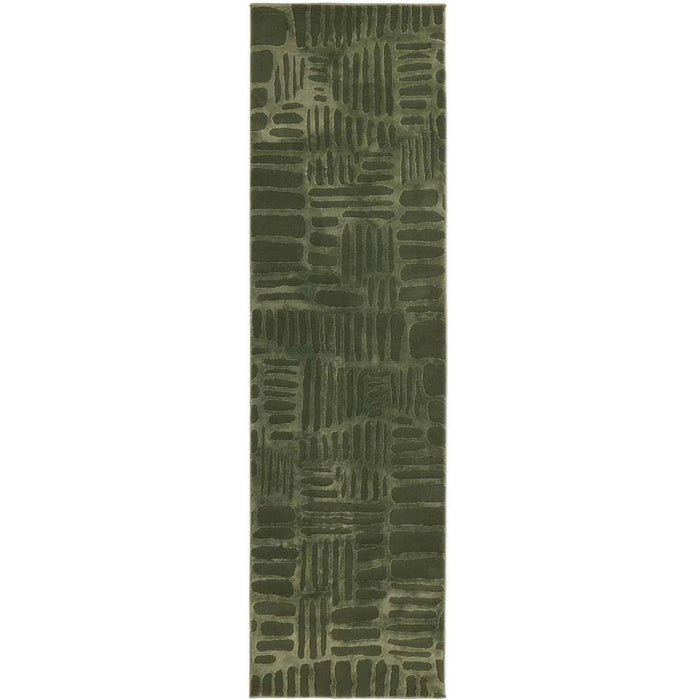 Green patterned rug on a white background