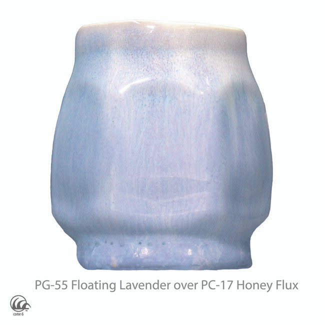 Faceted cup in PG-55 Floating Lavender glaze over PC-17 Honey Flux glaze at cone 6, soft pale blue-lavender