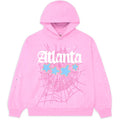 The Sp5der Atlanta Hoodie – Pink 440GSM Heavyweight Y2K Streetwear Pullover features bold white “Atlanta” gothic text, blue stars, sparkling sleeve details, and a pink spider-web design—perfect for Y2K streetwear fans.
