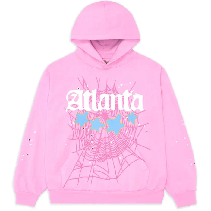 The Sp5der Atlanta Hoodie – Pink 440GSM Heavyweight Y2K Streetwear Pullover features bold white “Atlanta” gothic text, blue stars, sparkling sleeve details, and a pink spider-web design—perfect for Y2K streetwear fans.