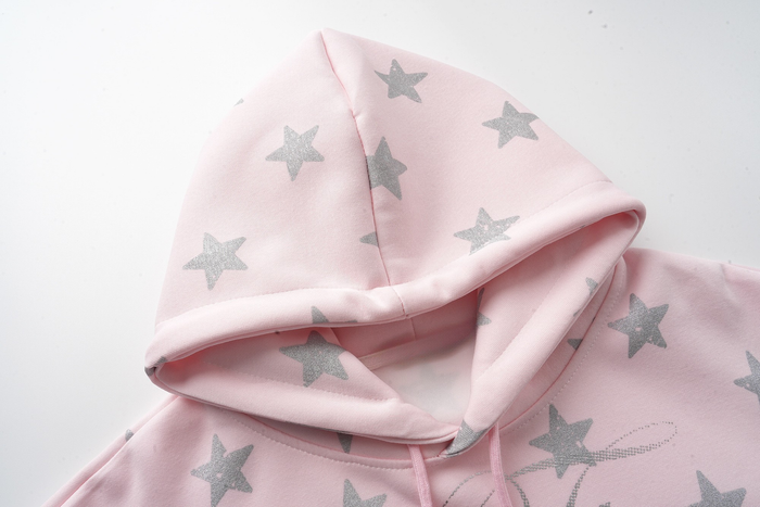 Pink star print hoodie hood close-up with soft lining