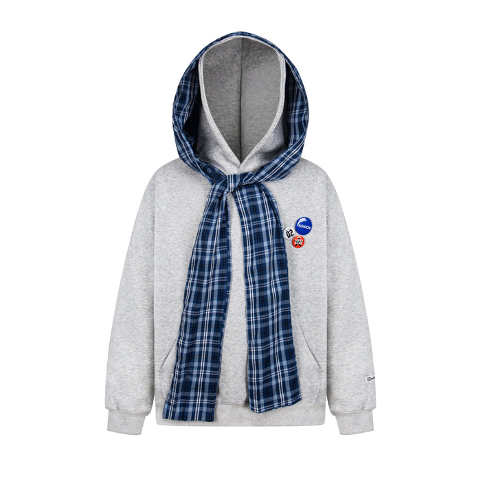 Light gray hooded sweatshirt with blue plaid scarf wrapped around the hood and front