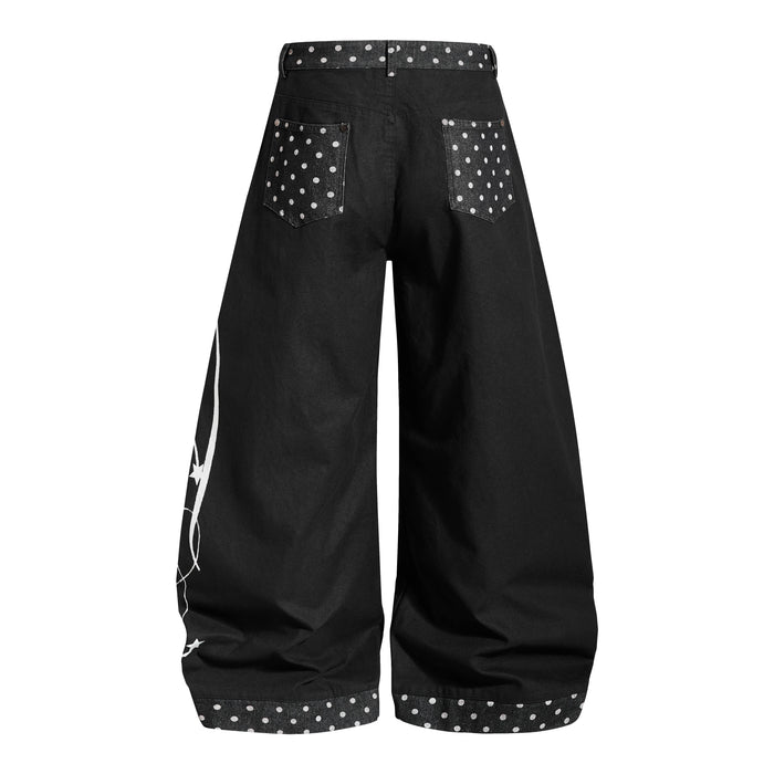 Black wide-leg denim jeans with polka dot back pockets and waistband, back view