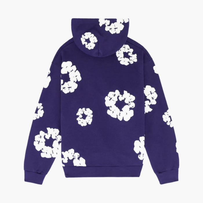 The Purple “Cotton Wreath” Denim Tears Hoodie is a streetwear pullover featuring a hood and white floral print, inspired by the signature Denim Tears design.
