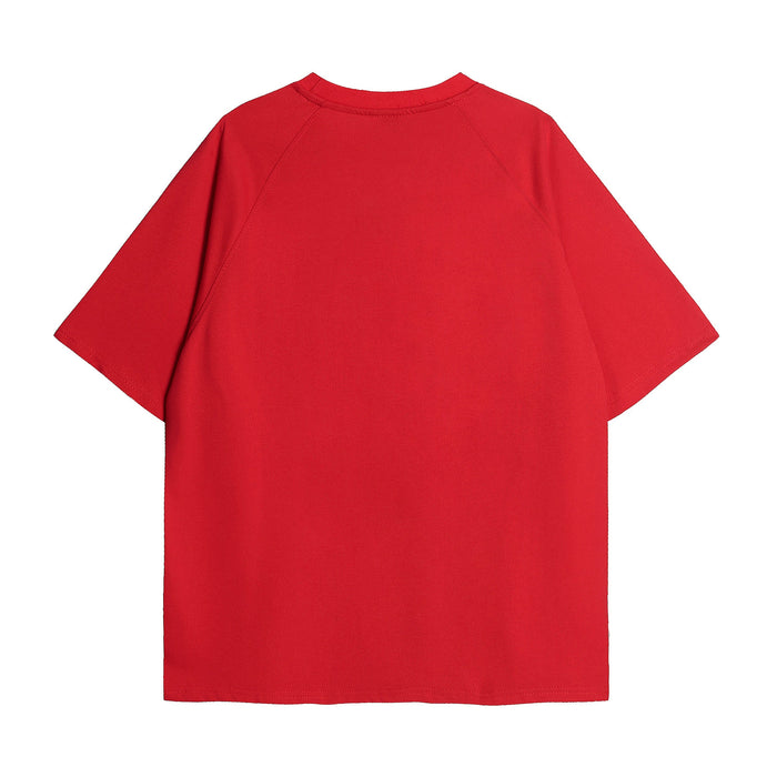 Red raglan graphic tee with short sleeves and a clean streetwear silhouette on a white background