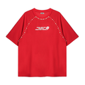 Red studded raglan graphic tee with pearl accents and bold chest print on a streetwear cotton shirt