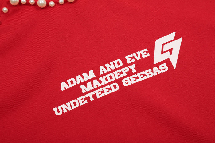 Red studded graphic tee with white Adam and Eve Maxxdepy Underteed Geesas print and pearl accents