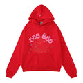The Sp5der “555” Web Hoodie – Red & Pink 440GSM Heavyweight Oversized Streetwear Pullover features pink 555 text above a white spiderweb with blue and white stars, plus a front pocket and drawstring hood for comfort and style.