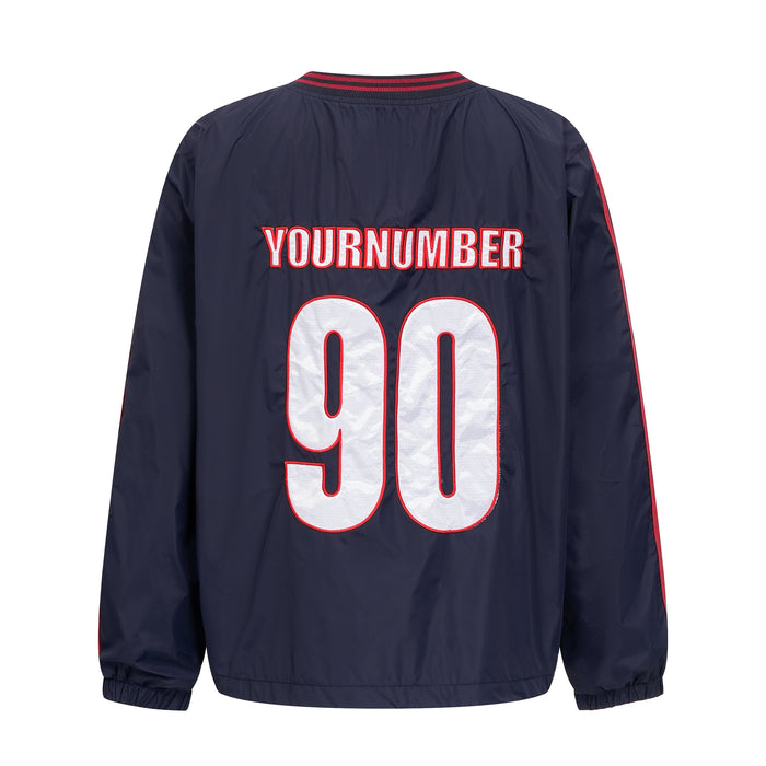 Back of navy nylon pullover with YOURNUMBER 90 graphic and red-trimmed collar