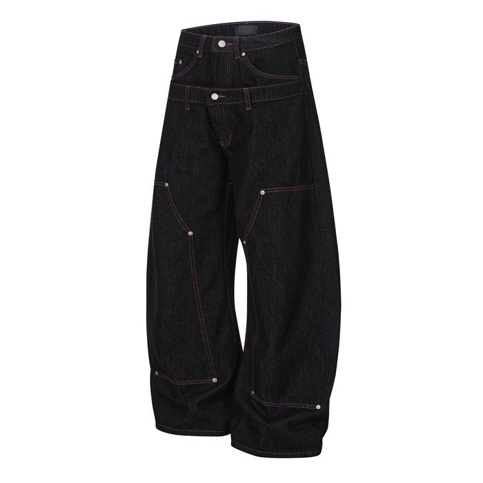 Angled front view of black wide-leg denim pants with pink contrast stitching and pocket details