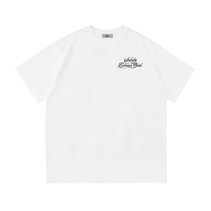 White oversized tee with small Saludo Estevan Oriol script graphic on the chest
