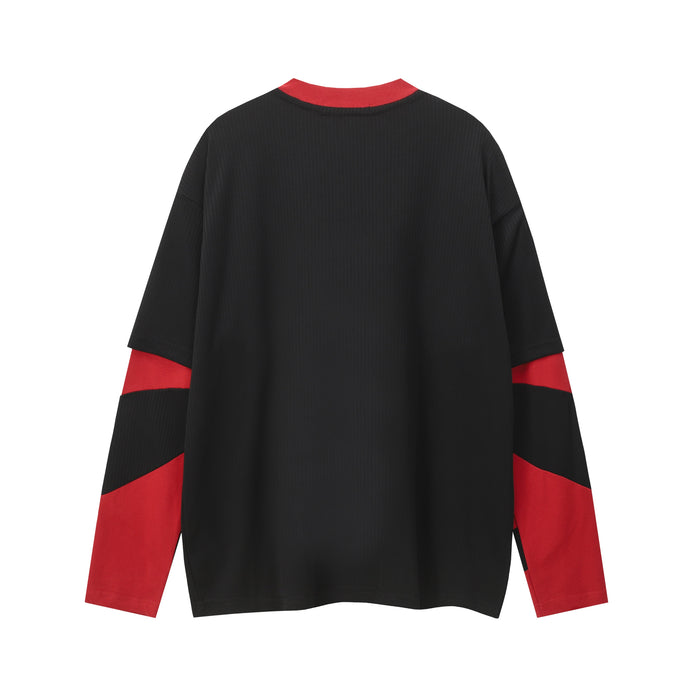 Back view of black mesh hockey jersey with red collar and red sleeve panels