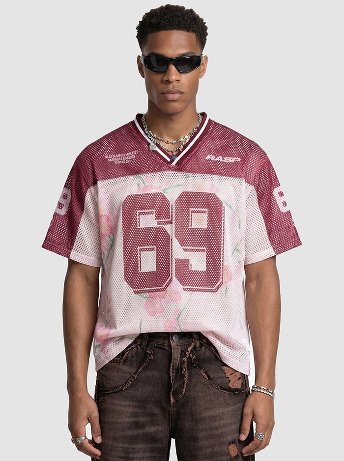 Maroon floral mesh jersey T-shirt with large 69 graphic and V-neck streetwear styling on model