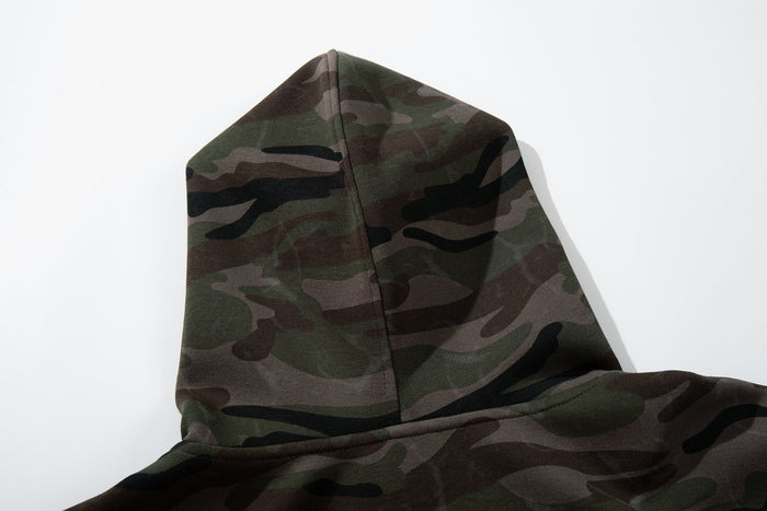 Close-up of camouflage hood with center seam and soft knit texture