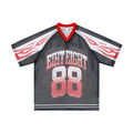 Black mesh jersey with red flame sleeve graphics, gradient number 88 print, and red V-neckline, front view