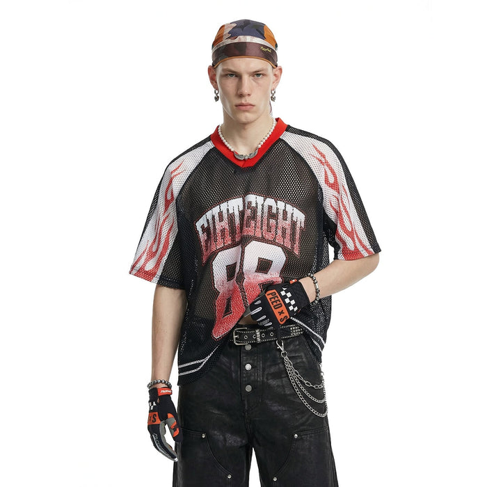 Black mesh jersey T-shirt with red flame sleeves and bold college 88 graphic, styled with streetwear accessories