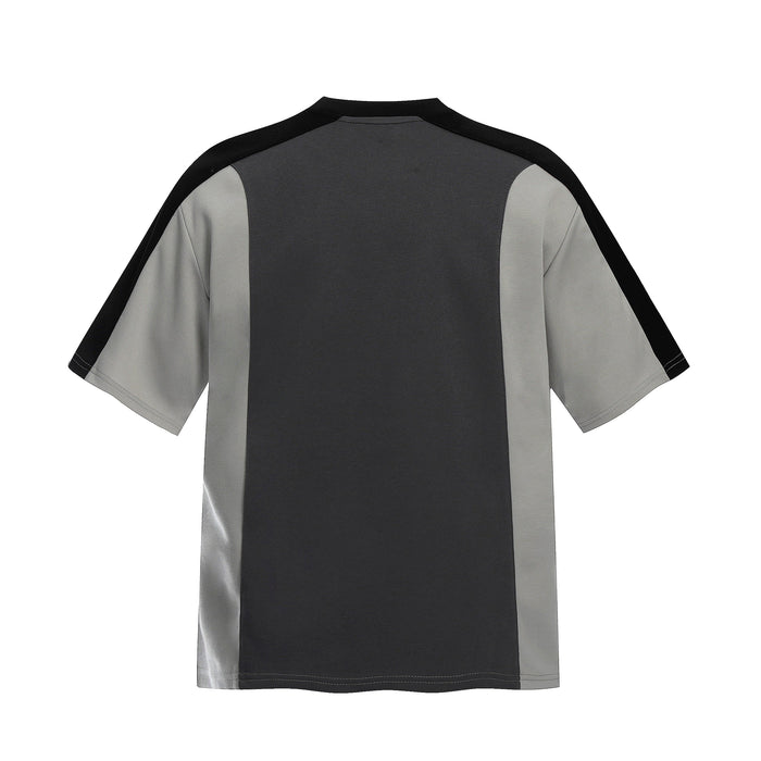 Black and gray color block cotton tee with contrast panels and short sleeves, shown flat on a white background