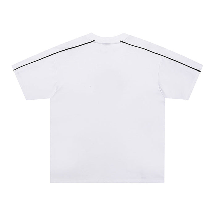 White cotton tee with black piping along the shoulders and sleeves, featuring a relaxed athletic streetwear fit