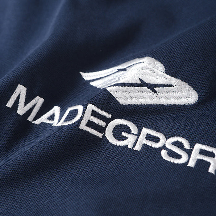 Navy cotton tee with embroidered MADEGPSR logo and athletic streetwear branding