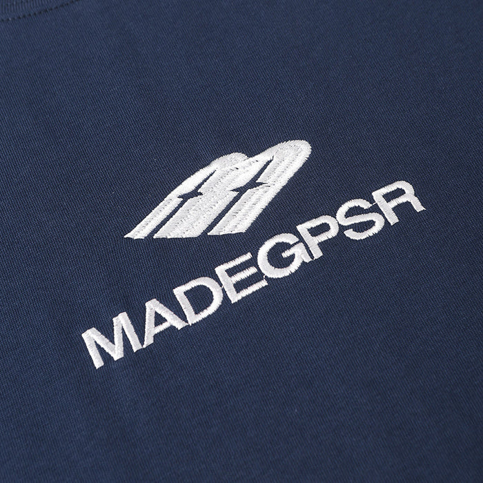 Navy cotton tee with embroidered white MADEGPSR logo and minimalist athletic streetwear design