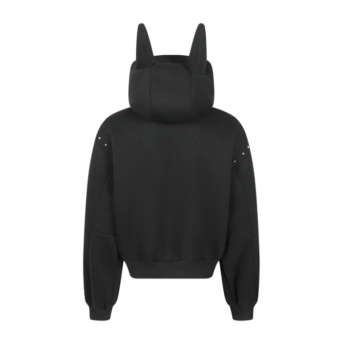 Black back view of oversized hoodie with devil horn hood and ribbed hem