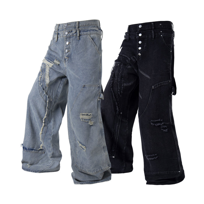 Front view of distressed denim pants in light blue and black with button fly