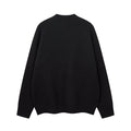 Black knit sweater front with ribbed trim and plain crew neck