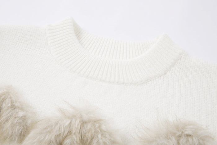 Close-up of white ribbed sweater crew neck and soft knit texture