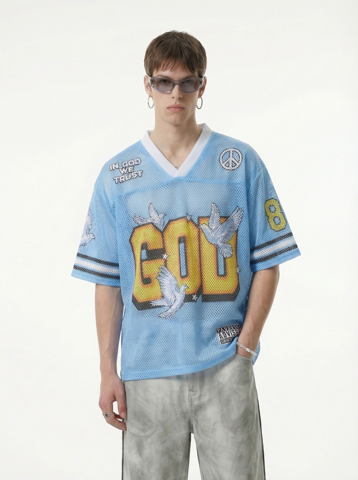 Light blue mesh jersey T-shirt with bold GOD graphic, dove prints, and streetwear-inspired details