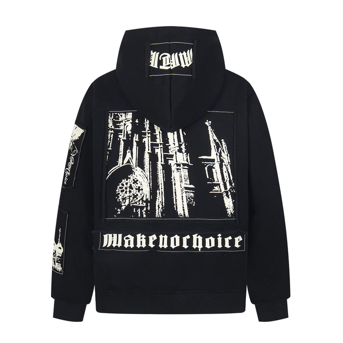 Back of black zip-up hoodie with white gothic text and graphic panel