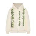 Cream zip hoodie front view with green gradient letter print and hood