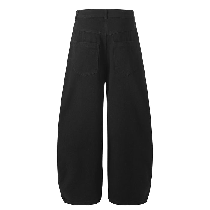 Back view of black wide-leg pants with plain pockets and straight leg silhouette