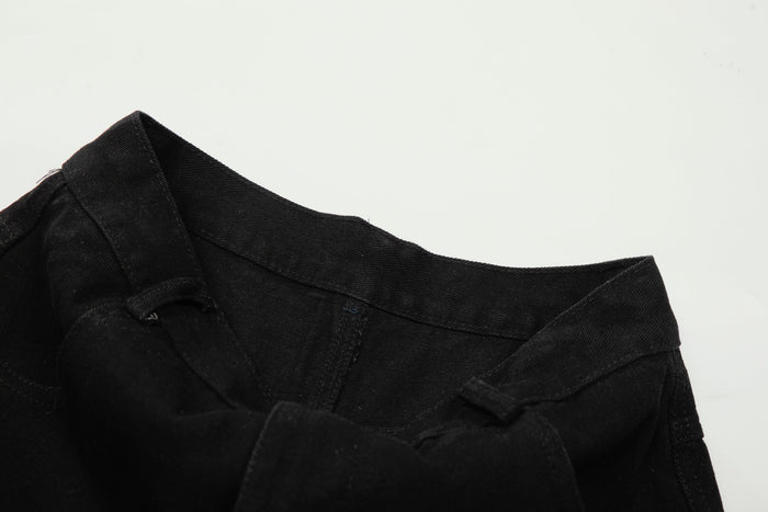 Close-up of black waistband and upper seam detail