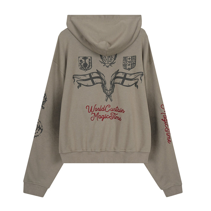 Taupe zip-up hoodie back view with black crest graphics and red script text