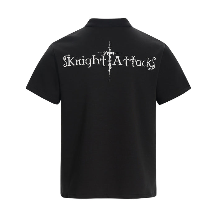 Black polo tee with white Knight Attack gothic graphic on the back, featuring a medieval-inspired streetwear design