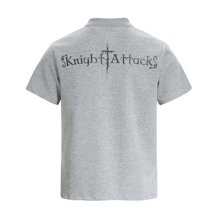 Gray polo tee with back graphic reading Knight Attack and a distressed sword design