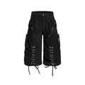 Black utility cargo shorts with lace-up front panels, front view