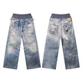 Front and back view of heavily distressed wide-leg jeans with layered waistband and faded blue wash